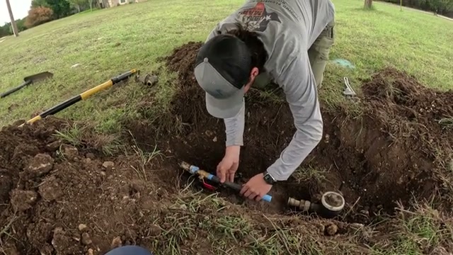 Micah installing new PRV on main water line in Lampasas TX